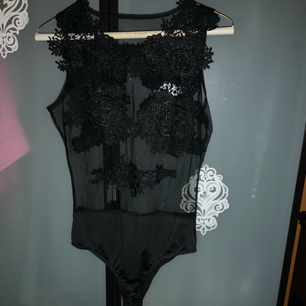 Black sheer and lace sexy bodysuit